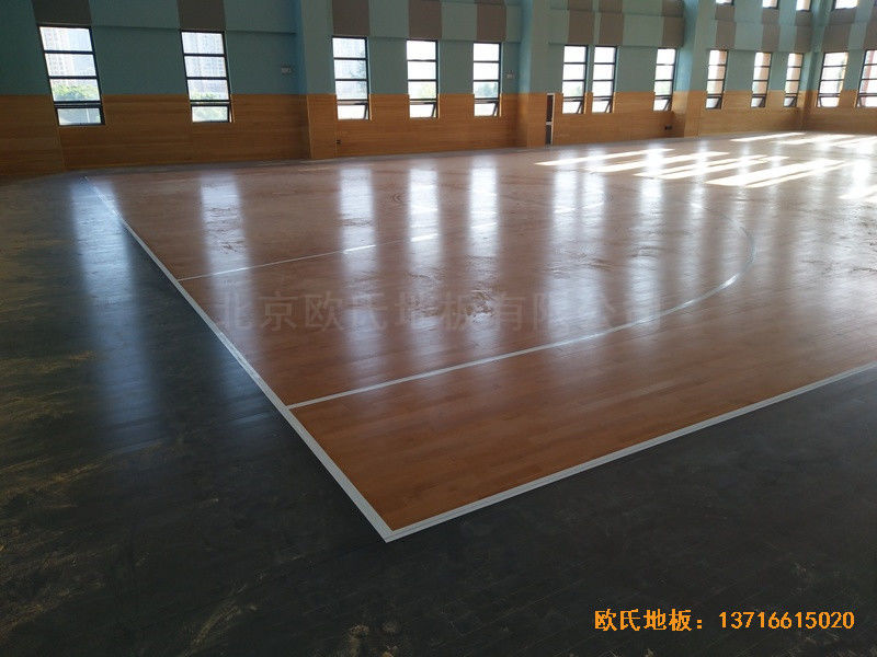武漢廣阜屯小學(xué)清江錦城分?；@球館運動地板施工案例0