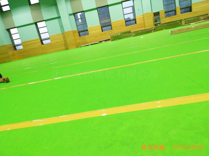 武漢廣阜屯小學(xué)清江錦城分?；@球館運動地板施工案例3